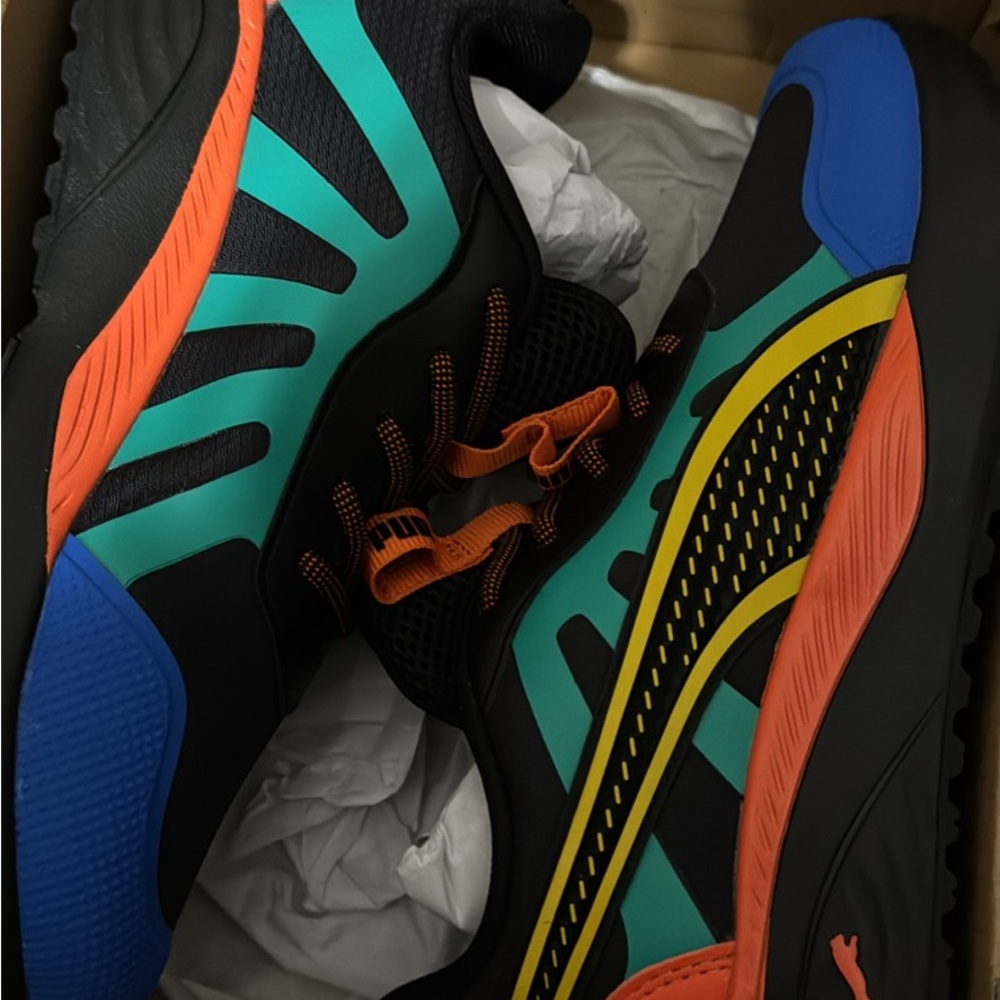 Puma Men's Black and Teal Sneakers with Orange Accents